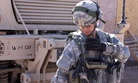 A soldier uses a JTRS Rifleman Radio during a network evaluation exercise in 2011. 