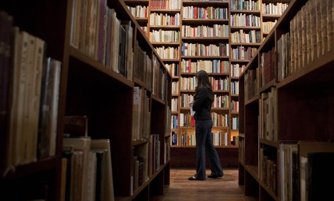 A librarian stands in Mexico City's City of Books library.