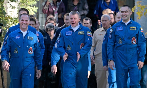 The three members of the next expedition to the International Space Station. The three members of the next expedition to the International Space Station.