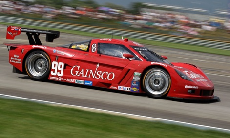 A car drives through the seventh turn during the Rolex Grand Am race at the Indianapolis Motor Speedway.