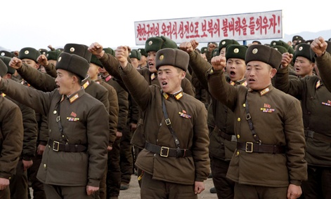 In this Nov. 23, 2012 photo, North Korean soldiers vow to retaliate against any South Korean military action during a rally in South Hwanghae Province. In this Nov. 23, 2012 photo, North Korean soldiers vow to retaliate against any South Korean military action during a rally in South Hwanghae Province.
