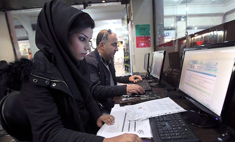 Iranians surf the web in an internet cafe at a shopping center, in central Tehran, Iran.