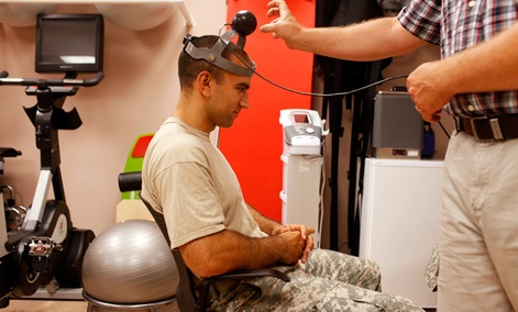 1st Lt. Timothy Dwyer has a sensor strapped to his head which will measure his head movement during cognitive testing at the Fort Campbell Army base in Fort Campbell, Ky.