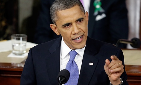 President Barack Obama gestures while giving his State of the Union address. 