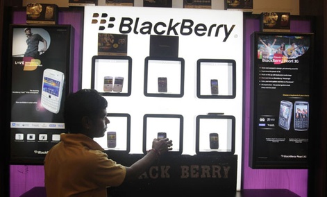 A shopkeeper displays BlackBerry mobile phones in his shop in Ahmadabad, India in 2010. A shopkeeper displays BlackBerry mobile phones in his shop in Ahmadabad, India in 2010.