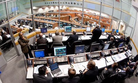 NASA mission managers work in Firing Room Four of the Launch Control Center at NASA Kennedy Space Center.