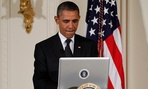 President Barack Obama uses a laptop computer to send a tweet during a "Twitter Town Hall." President Barack Obama uses a laptop computer to send a tweet during a "Twitter Town Hall."