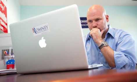 A Romney volunteer works on a campaign Facebook page in 2012.