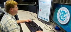A cyber security analyst works in the "watch and warning center" in Idaho Falls, Idaho in 2011.