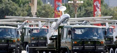A truck loaded with the Chinese made drone, the ASN-207, takes part in a military parade in Beijing, China.