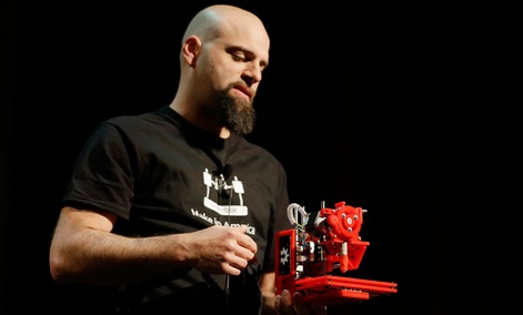 Brook Drum, the founder and CEO of Printrbot, displays and talks about his $299 portable 3D printer during the Hardware Innovation Workshop in San Mateo, Calif. Brook Drum, the founder and CEO of Printrbot, displays and talks about his $299 portable 3D printer during the Hardware Innovation Workshop in San Mateo, Calif.
