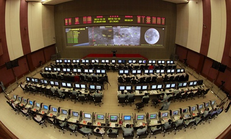 Researchers work in the control room of the Chang'e 3 lunar probe at the Beijing Aerospace Control Center,. Researchers work in the control room of the Chang'e 3 lunar probe at the Beijing Aerospace Control Center,.