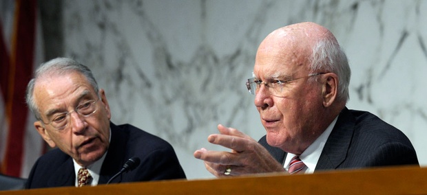 Senate Judiciary Committee Chairman Sen. Patrick Leahy, D-Vt., left, accompanied by the committee's ranking Republican Sen. Charles Grassley, R-Iowa. Senate Judiciary Committee Chairman Sen. Patrick Leahy, D-Vt., left, accompanied by the committee's ranking Republican Sen. Charles Grassley, R-Iowa.