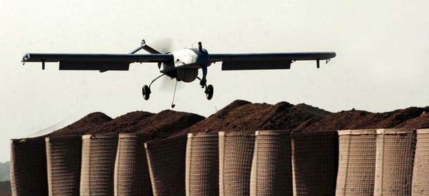An unmanned drone RQ-7A "Shadow" lands at an American military base in Baqouba, Iraq. An unmanned drone RQ-7A "Shadow" lands at an American military base in Baqouba, Iraq.