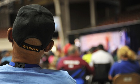 A man watches the Opening Ceremonies of the 28th National Veterans Golden Age Games. A man watches the Opening Ceremonies of the 28th National Veterans Golden Age Games.