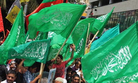 Supporters of Hamas rally in the West Bank city of Nablus in May. Supporters of Hamas rally in the West Bank city of Nablus in May.