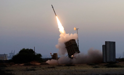 An Iron Dome air defense system fires to intercept a rocket from Gaza Strip in the costal city of Ashkelon, Israel. An Iron Dome air defense system fires to intercept a rocket from Gaza Strip in the costal city of Ashkelon, Israel.