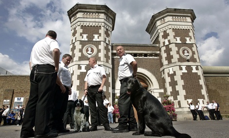 Staff strike outside the main gate of the Wormwood Scrubs prison in west London. Staff strike outside the main gate of the Wormwood Scrubs prison in west London.