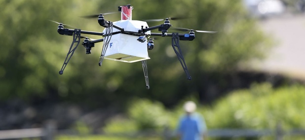A drone aircraft carries simulated blood and other medical samples flies during a ship-to-shore delivery simulation Wed., June 22, 2016, in Lower Township, N.J. A drone aircraft carries simulated blood and other medical samples flies during a ship-to-shore delivery simulation Wed., June 22, 2016, in Lower Township, N.J.