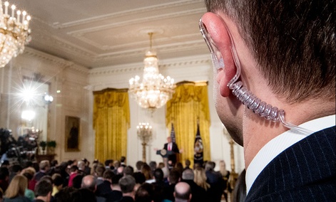 A Secret Service agent stands as President Donald Trump speaks during a news conference, Thursday, Feb. 16, 2017, in the East Room of the White House. A Secret Service agent stands as President Donald Trump speaks during a news conference, Thursday, Feb. 16, 2017, in the East Room of the White House.