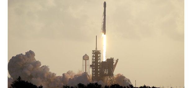 A Falcon 9 SpaceX rocket carrying a classified satellite for the National Reconnaissance Office lifts off from pad 39A at the Kennedy Space Center in Cape Canaveral, Fla. A Falcon 9 SpaceX rocket carrying a classified satellite for the National Reconnaissance Office lifts off from pad 39A at the Kennedy Space Center in Cape Canaveral, Fla.