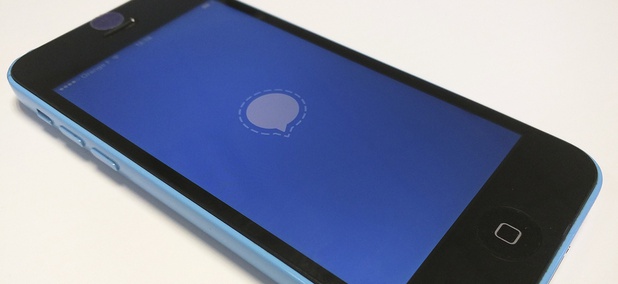 The Signal encrypted messaging app loading on a smartphone. The Signal encrypted messaging app loading on a smartphone.