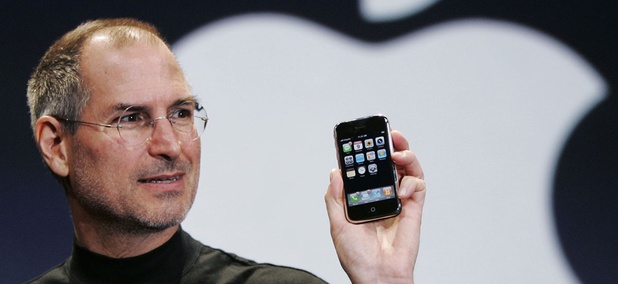 Apple CEO Steve Jobs holds up an Apple iPhone at the MacWorld Conference in San Francisco in 2007. Apple CEO Steve Jobs holds up an Apple iPhone at the MacWorld Conference in San Francisco in 2007.