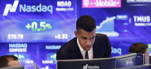 Brad Smith monitors stock prices at the Nasdaq MarketSite, Tuesday, April 25, 2017, in New York. Brad Smith monitors stock prices at the Nasdaq MarketSite, Tuesday, April 25, 2017, in New York.