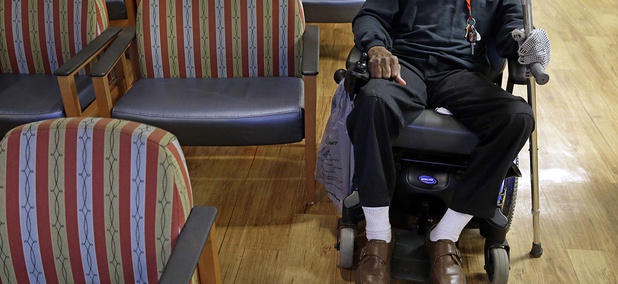 A U.S. Army veteran waits for prescription drugs in a pharmacy waiting room inside the Fayetteville Veterans Affairs Medical Center in Fayetteville, N.C. A U.S. Army veteran waits for prescription drugs in a pharmacy waiting room inside the Fayetteville Veterans Affairs Medical Center in Fayetteville, N.C.