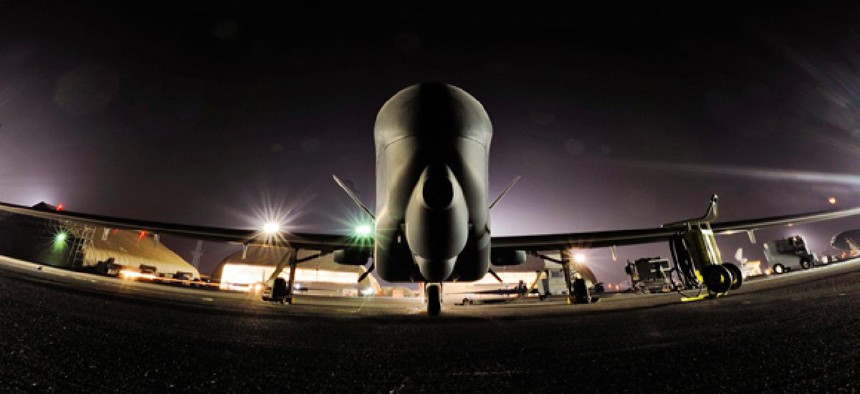 EQ-4 Global Hawk carrying the Battlefield Airborne Communications Node awaits takeoff.