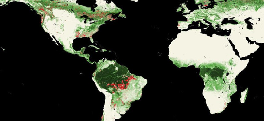Landsat satellites show worldwide forest losses, marked in red, from 2000-2005.   