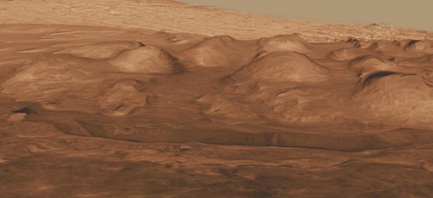 The  Gale Crater shows layers of rock that preserve a record of environments on Mars. 