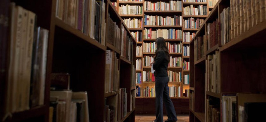 A librarian stands in Mexico City's City of Books library.