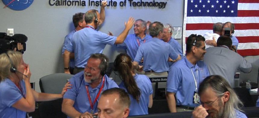 NASA staff at the Jet Propulsion Laboratory celebrate the landing of Curiosity. 