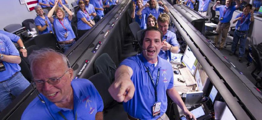 NASA/JPL ground controllers react to learning the Curiosity rover had landed safely on Mars.