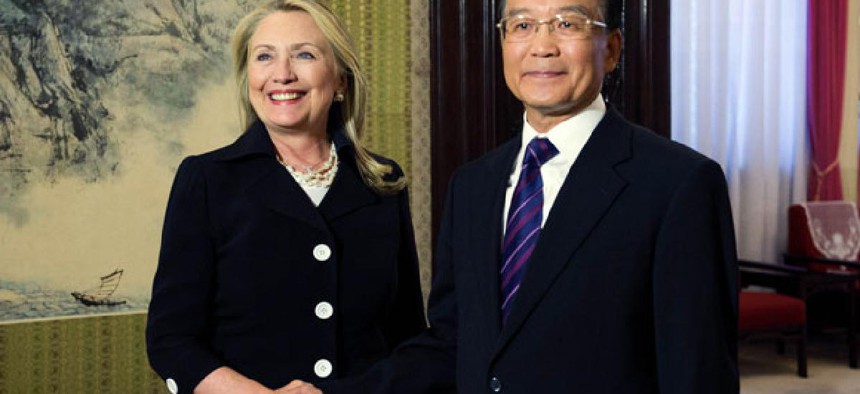 Hillary Rodham Clinton, left, shakes hands with Chinese Premier Wen Jiabao during a bilateral meeting at the Zhongnanhai leadership compound in Beijing Wednesday.