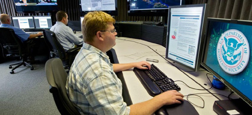 Homeland Security analysts work in a cybersecurity center in 2011.