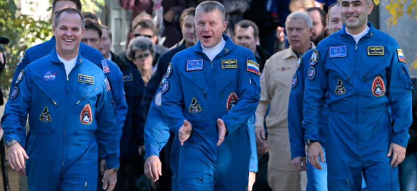 The three members of the next expedition to the International Space Station.