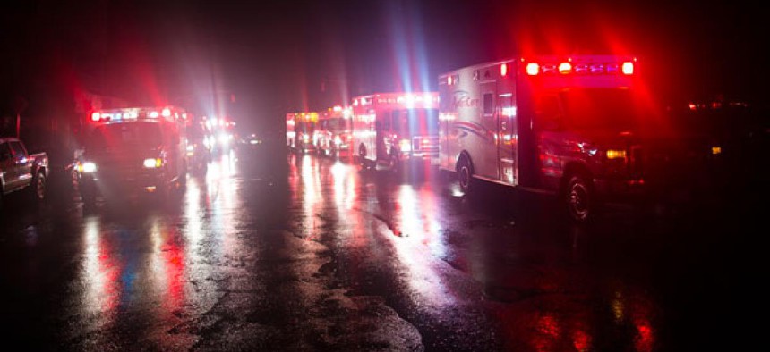 Ambulances wait outside New York University Tisch Hospital during the storm.