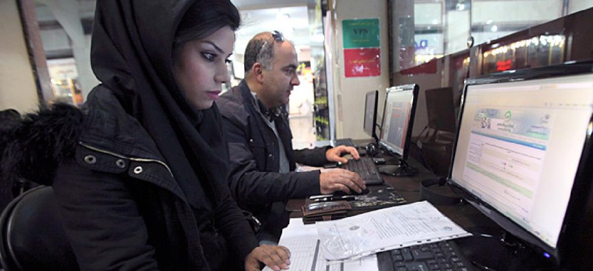 Iranians surf the web in an internet cafe at a shopping center, in central Tehran, Iran.