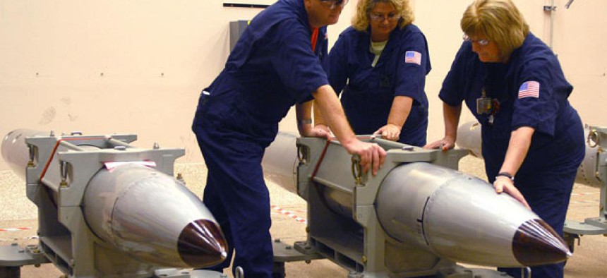 Technicians at the Pantex Plant in Texas ready a B-61 nuclear gravity bomb for a 2007 surveillance test.