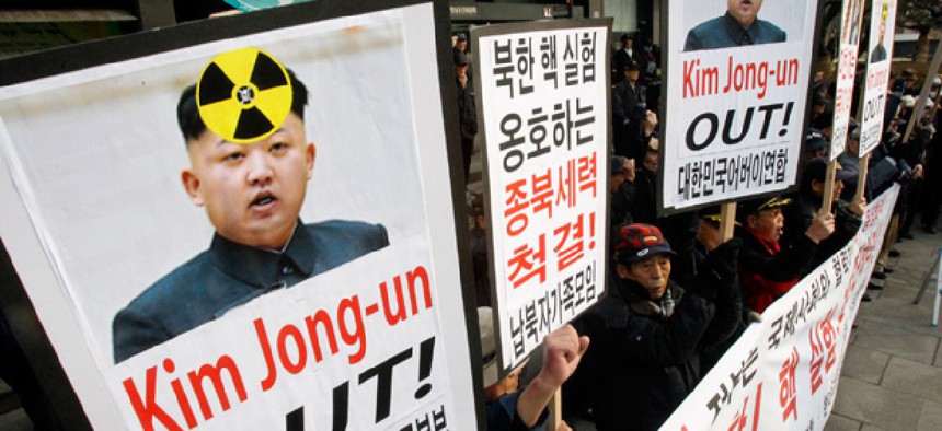 South Korean protesters shout slogans during a rally against possible nuclear tests by North Korea in Seoul, South Korea.