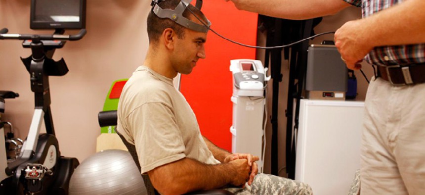 1st Lt. Timothy Dwyer has a sensor strapped to his head which will measure his head movement during cognitive testing at the Fort Campbell Army base in Fort Campbell, Ky.