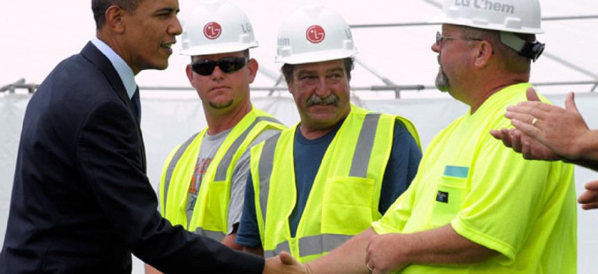 President Obama greets workers in 2010, at the groundbreaking ceremony at LG Chem Michgan Inc., then known as Compact Power Inc., a battery plant in Holland, Mich. 