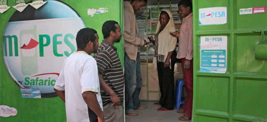 Users visit an M-Pesa location in Nairobi in 2011.