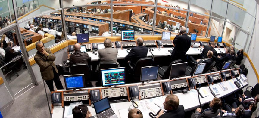 NASA mission managers work in Firing Room Four of the Launch Control Center at NASA Kennedy Space Center.