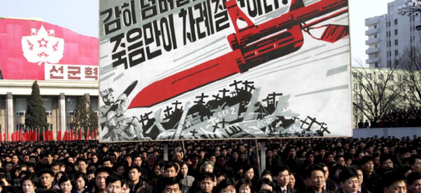 North Koreans attend a rally to support a statement given on Tuesday by a spokesman for the Supreme Command of the Korean People's Army vowing to cancel the 1953 cease-fire that ended the Korean War.
