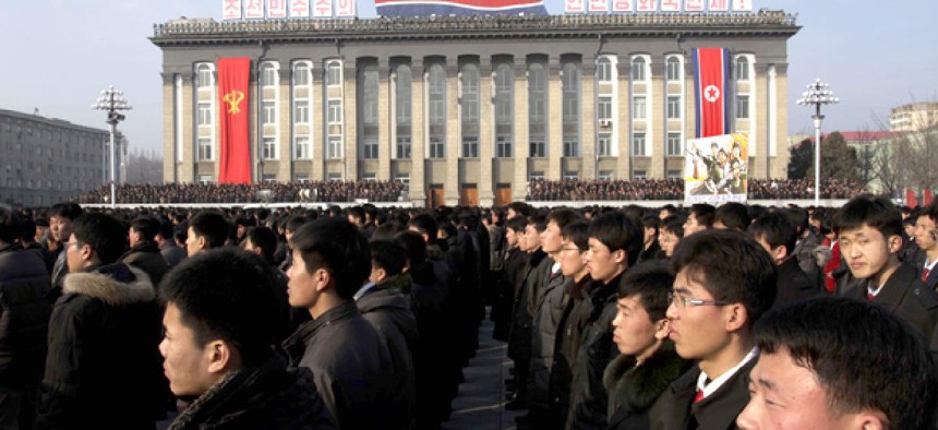 North Koreans attend a rally in support of a statement by a spokesman for the Supreme Command of the Korean People's Army vowing to cancel the 1953 cease-fire that ended the Korean War.