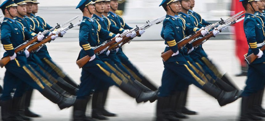 Soldiers of the Chinese People's Liberation Army's honor guard battalions march during a demonstration.