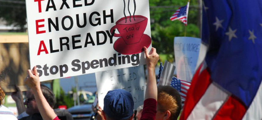 A protestor holds a sign at a Tea Party rally in Florida.
